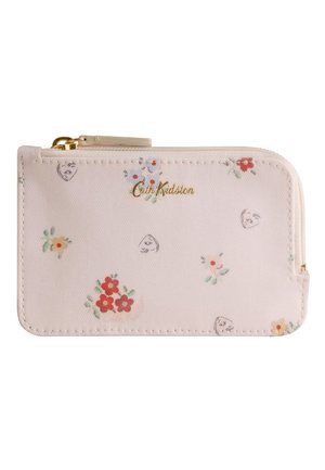 Kremfarvet pung med lynlås, dekoreret med et lille rødt og gråt blomsterprint og et gyldent "Cath Kidston"-logo på forsiden.