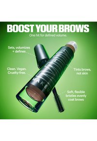 Eyebrow gel tube and brush with text highlighting volume, vegan, cruelty-free, tinting brows not skin, and soft bristles for even coating.