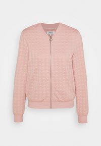 Giacca bomber trapuntata rosa chiaro con polsini e fondo a costine, zip frontale con tirante rotondo e tasche laterali.
