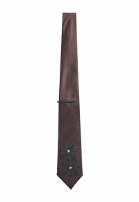 Brown satin tie featuring black floral design with white accents, slim shape, and a flat tie clip for secure fastening.