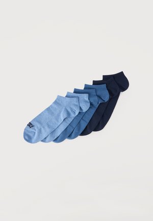 Six pairs of ankle socks arranged in a row, colors gradient from light blue to dark navy on a plain white background.