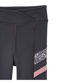 High-waisted black leggings with a textured waistband, floral print panel, and pink striped accents. Made from stretchy, moisture-wicking fabric.