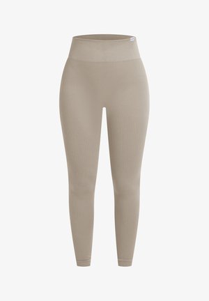 Leggings a coste beige con vita alta, caratterizzati da una texture liscia e un design aderente, adatti per abbigliamento casual o sportivo.