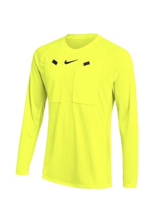 Langærmet neon gul sportstrøje med sort Nike-logo og to sorte rektangulære mærker nær brystet på hvid baggrund.