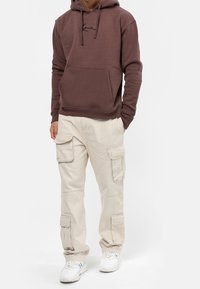 Karl Kani Jersey con capucha - brown
