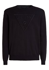 Mustassa hupparissa on pehmeä kangas, keskellä on teksturoitu kolmiomainen logo, ja hihat sekä helma ovat ribbikudottua materiaalia tiiviin istuvuuden saavuttamiseksi.