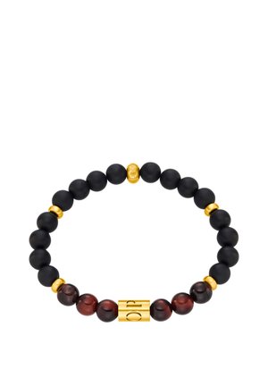 Matte black beads interspersed with gold accents and dark red polished beads. Features a cylindrical gold spacer with engraved detail.