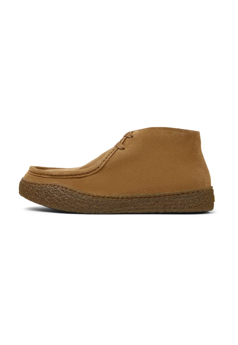 Brown suede ankle boots with a rounded toe, stitched detailing, and a textured rubber sole. Features a simple lace-up design.