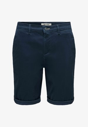 Shorts ajustés pour homme bleu marine avec revers roulés, fermeture boutonnée, passants pour ceinture, poches latérales et étiquette visible "Only & Sons" à l'intérieur de la ceinture.