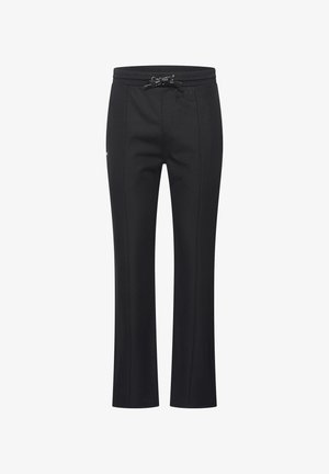 Black pants with a drawstring waistband, tapered fit, and subtle textural detailing. Features two side pockets and clean, straight legs.