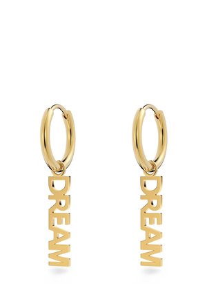 Gold-tone hoop earrings featuring a hanging "DREAM" charm with bold, block lettering. Smooth finish with a polished texture.