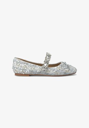 Glittering silver ballet flat with sequined surface, rounded toe, and decorative strap embellished with rhinestones. Low wooden heel.