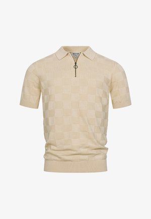 Polo beige à manches courtes avec un motif à carreaux subtil, ourlet et poignets côtelés, et une fermeture éclair frontale avec un tire-zip rond.