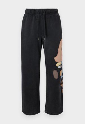 Melnas sporta bikses ar elastīgu jostu un aizdares auklu. Sānos ir krāsains abstrakts šūšanas dizains ar dažādām formām.