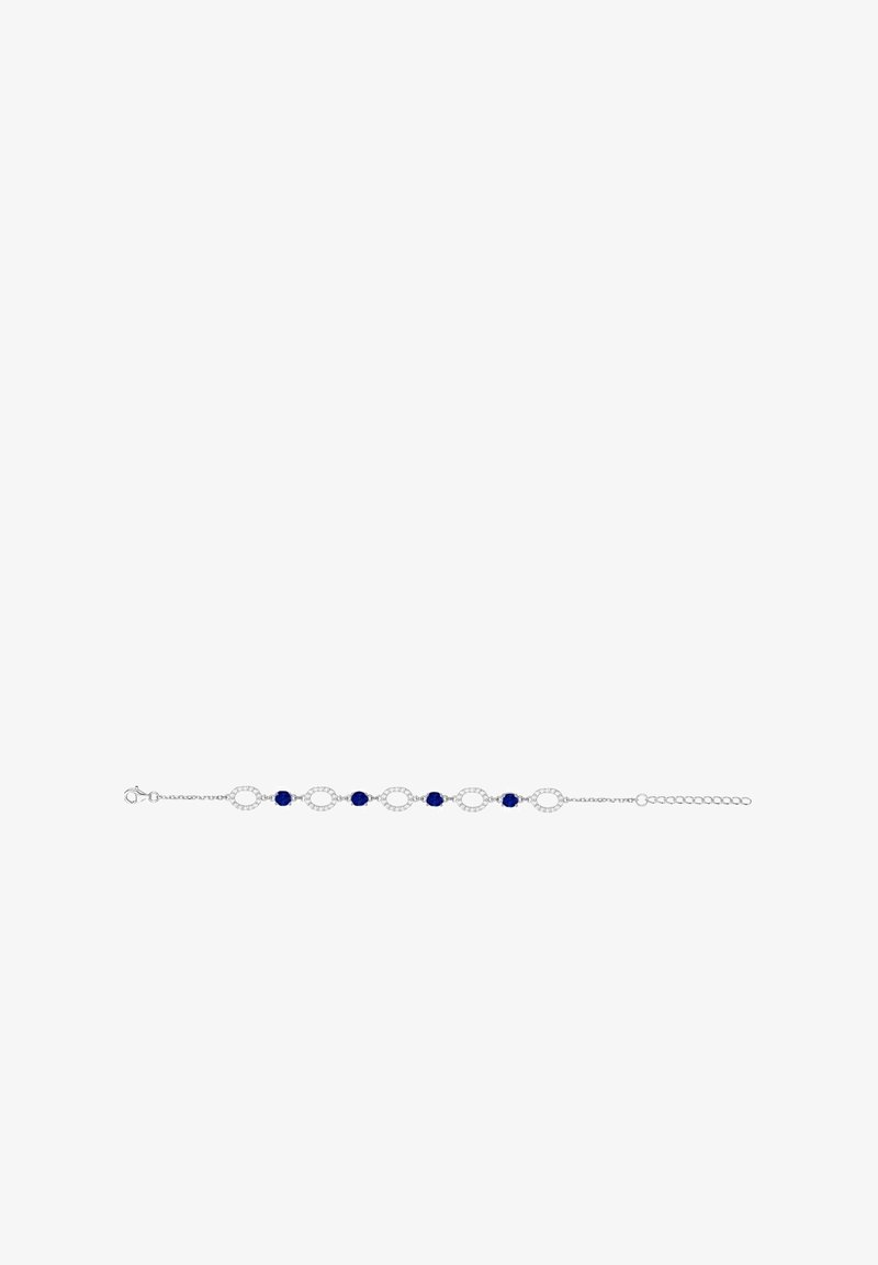 Bracelet en argent avec des maillons ovales alternés et de petites perles rondes bleu foncé, sécurisé par un fermoir mousqueton et une chaîne réglable.