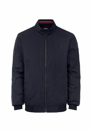 Granatowa kurtka bombowca z zapięciem na zamek, wysokim kołnierzem, dwoma bocznymi kieszeniami, elastycznymi mankietami oraz czerwonymi akcentami wzdłuż klatki piersiowej i kieszeni.