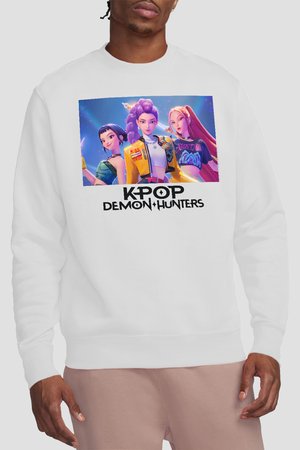 Man wearing white sweatshirt with colorful digital art of three animated female K-pop characters and text "KPOP DEMON HUNTERS" below them.