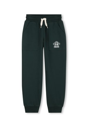 Pantalons de survêtement verts en tissu doux, dotés de deux poches latérales, d'une taille élastique avec cordon de serrage et d'un logo blanc sur la cuisse gauche.