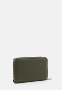 Zippered wallet in dark green faux leather, rectangular shape, smooth texture, with gold-tone zipper hardware and stitched detailing.
