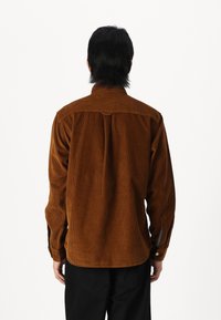 Jack & Jones JJCORDUROY  ciemnobrązowy