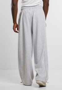 Karl Kani Tracksuit bottoms - grey