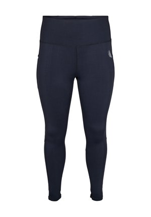 Námořnické modré legíny vyrobené z elastického materiálu, s vysokým pasem a plochými švy pro pohodlí a odolnost. Diskrétní logo detail na boku.