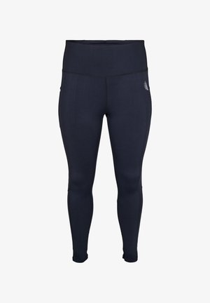 Mørkeblå leggings lavet af strækbart stof, med høj talje og flade sømme for komfort og holdbarhed. Diskret logo detaljer på siden.