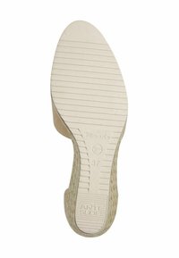Sandali con tomaia in tessuto beige, design aperto sul retro e suola in gomma testurizzata. Presentano una suola antiscivolo con marchio e indicazione della taglia 37.