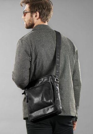 LUCLEON MONTREAL - Cross body bag - black