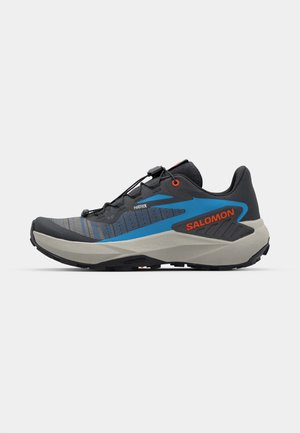 Salomon GENESIS - Trail running shoes - black/french blue/cherry tomato