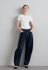 FRAME BAGGY BUBBLE - Relaxed fit jeans - dorado