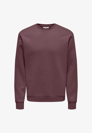 Sweat-shirt uni à manches longues et col rond, de couleur mauve foncé, avec poignets et ourlet côtelés, présenté sur un fond blanc.