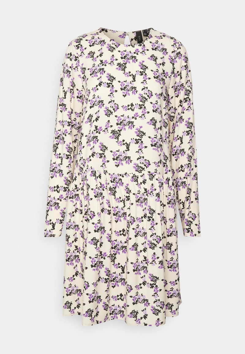 Vestido floral em creme com padrão floral em púrpura e preto, mangas longas, decote redondo e saia com pregas. Feito de um tecido leve e suave.