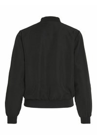 Blouson noir avec un col et des poignets côtelés, un ourlet élastique, un tissu légèrement rembourré et une texture lisse, présentant une silhouette simple et classique.