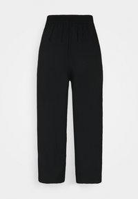 Pantalon noir taille haute avec ceinture élastique et jambes larges et droites, présenté de face sur un fond blanc uni.