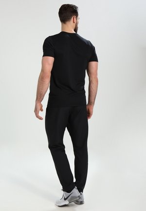 T-shirt con stampa - black
