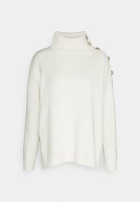 Vit stickad tröja med hög krage, sidoknappar, sänkt axel och ribbade mudd och nederkant. Mjuk textur med en avslappnad passform.
