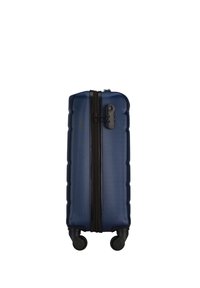 Navy blue hard-shell suitcase with a textured surface, black zipper, side handle, and four black wheels for easy maneuverability.