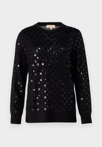 Schwarzer Pullover mit strukturierten Oberflächen und glänzenden, runden Pailletten in unterschiedlichen Größen, geripptem Kragen und langen Ärmeln.