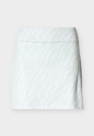 Jasnozielona spódnico-spodenka z teksturowanym białym wzorem, posiadająca płaski pas i prosty dół. Wykonana z gładkiej, oddychającej tkaniny.
