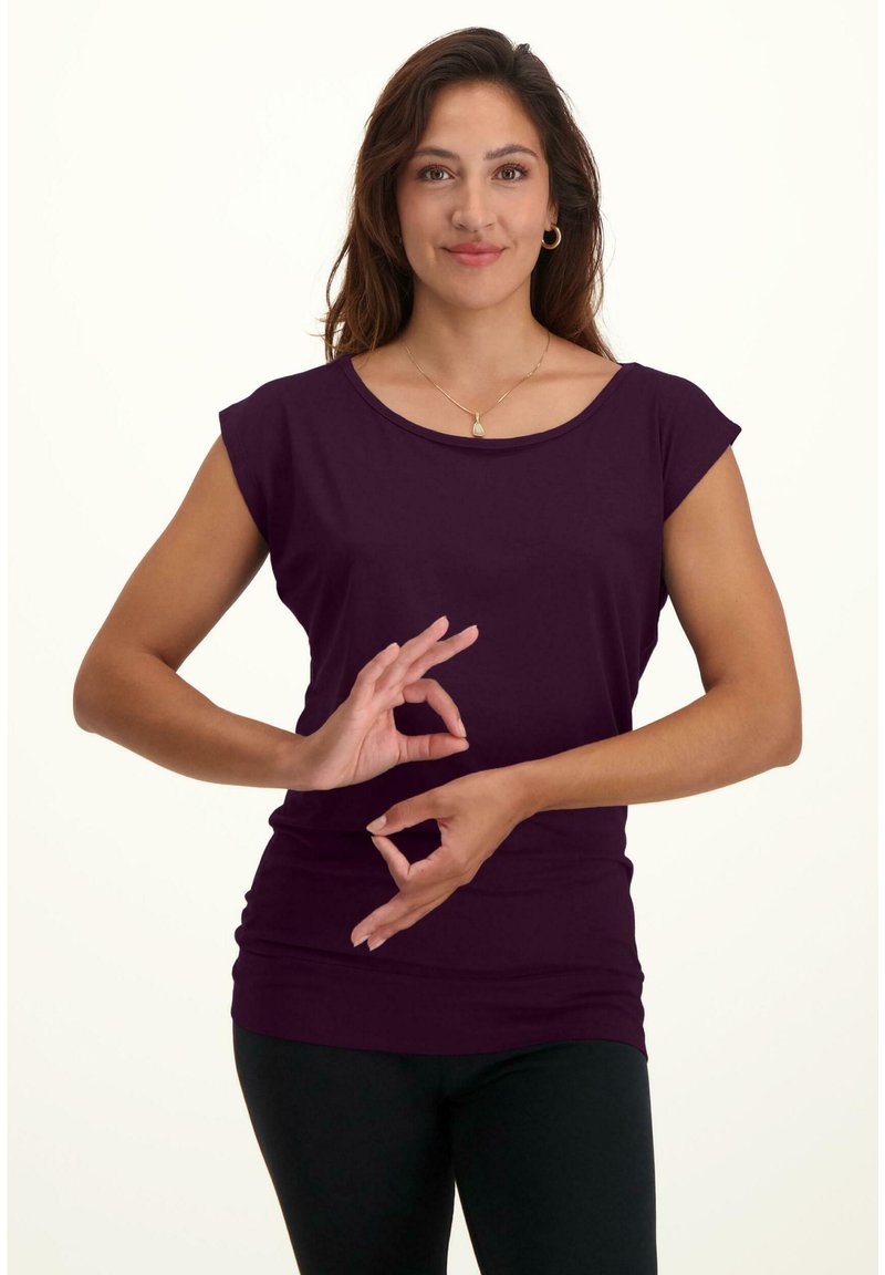 Keep Calm and Do Yoga. Girl in Homukhasana Pose. Hand Drawn Color