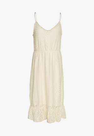 Vestido midi sin mangas color crema con patrones de encaje, tirantes de espagueti ajustables, cintura fruncida y dobladillo con volantes.