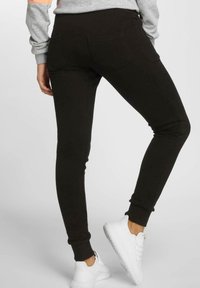 DEF IVYBEE  - Jogginghose - black