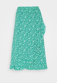 Grøn blomster nederdel med elastisk talje, der har et hvidt blomsterprint, et flydende design og en detaljeret drapering i siden.