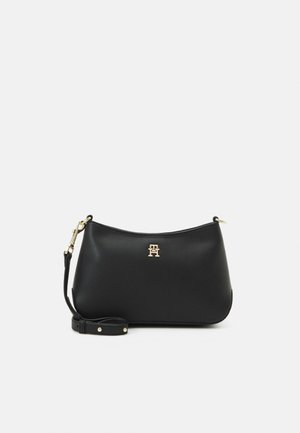 STAPLE CROSSOVER - Cross body bag - black