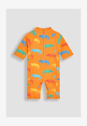 Žiarivo oranžový plavky s krátkym rukávom a zipsom, s farebnými vzormi krokodílov v červenej, modrej, zelenej a žltej farbe. Vyrobené z elastického materiálu.