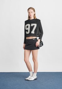 Puma MICRO MINI SKIRT - Minissaia - black