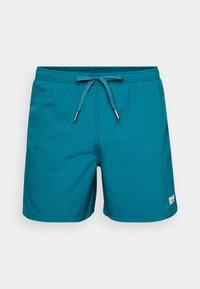 Shorts de bain teal en tissu léger et à séchage rapide. Dotés d'une taille élastique avec cordon de serrage et d'une petite étiquette logo sur le côté.