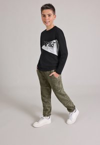 Blue Seven Langarmshirt - schwarz