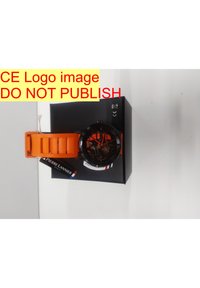 Sort ur med orange silikonerem, med design af skeletskive. Præsenteret på en sort æske med en mærkeetiket.